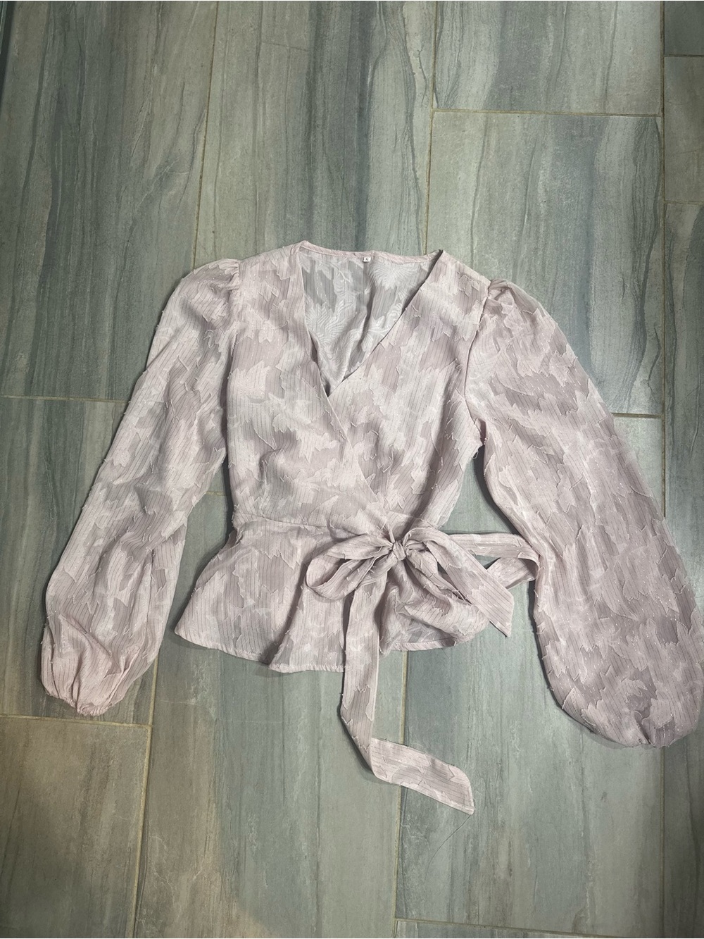 Pale pink textured wrap blouse